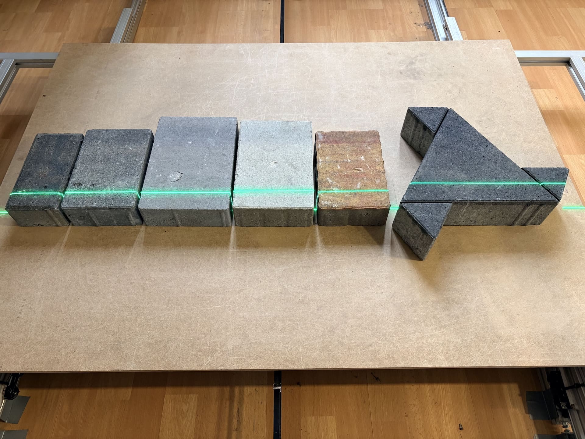 How do you choose a laser and its optics for flat surface line scanning?
